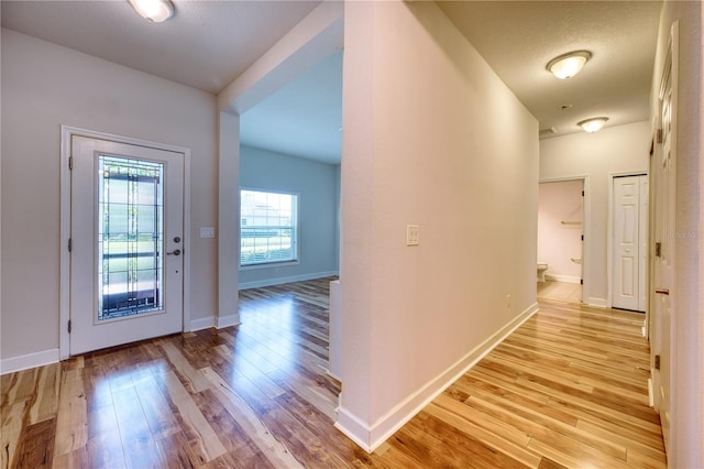 11924 Persian Ter, Bradenton, FL 34212 - corridor with light wood finished floors and baseboards