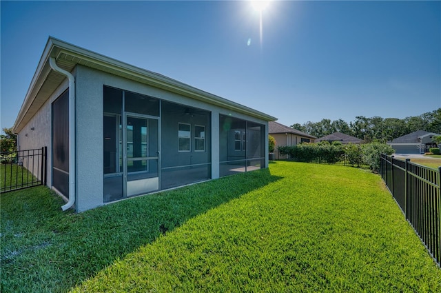 11924 Persian Ter, Bradenton, FL 34212 - back of house with a sunroom and stucco siding