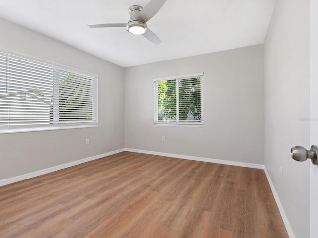 6116 Rodgers Ave, Sarasota, FL 34231 - spare room featuring a ceiling fan, baseboards, and light wood finished floors