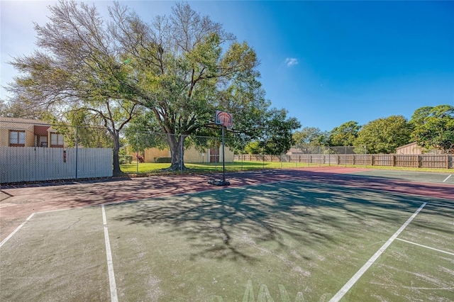 view of sport court with fence and community basketball court