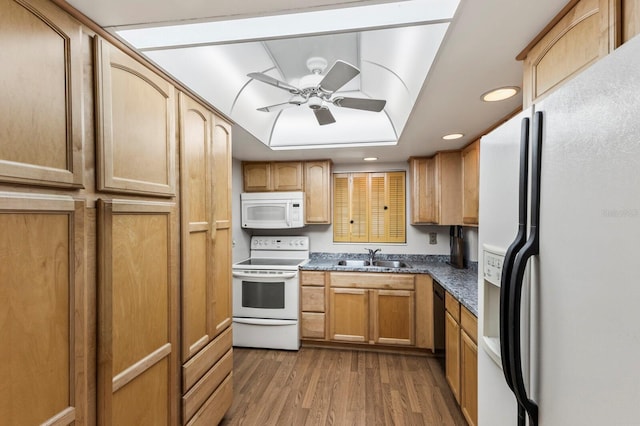 4015 Lake Bayshore Dr Unit 108, Bradenton, FL 34205 - kitchen featuring wood finished floors, a sink, ceiling fan, white appliances, and recessed lighting