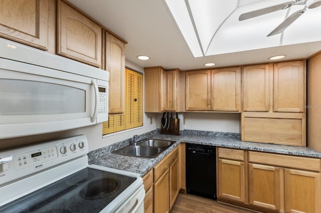 4015 Lake Bayshore Dr Unit 108, Bradenton, FL 34205 - kitchen with a ceiling fan, recessed lighting, white appliances, a sink, and light wood-style floors
