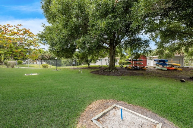 4015 Lake Bayshore Dr Unit 108, Bradenton, FL 34205 - view of yard featuring fence