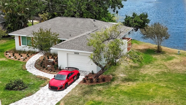 drone / aerial view featuring a water view