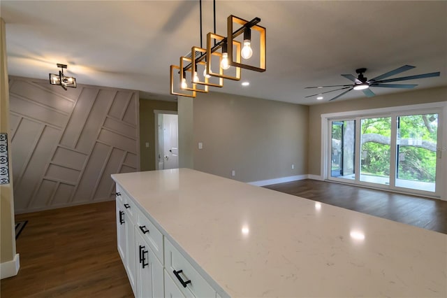 kitchen with baseboards, white cabinetry, ceiling fan, and dark wood-style floors