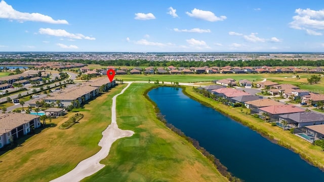 birds eye view of property with a residential view, view of golf course, and a water view