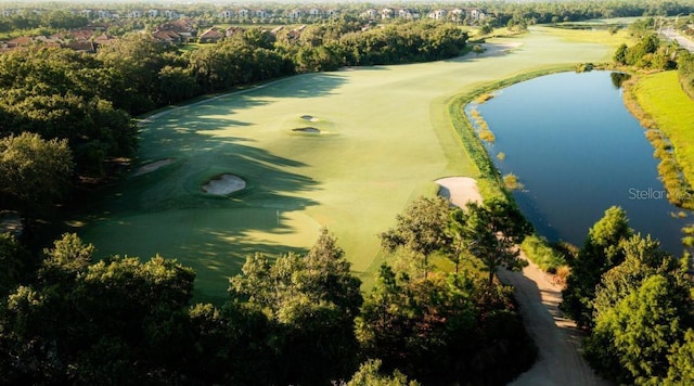 aerial view featuring a water view and golf course view