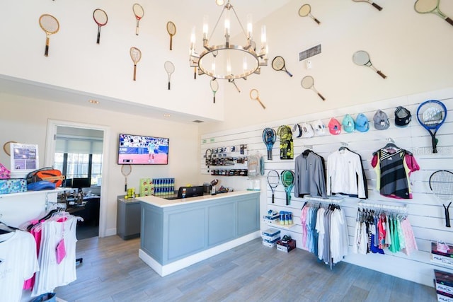 welcome area featuring a notable chandelier