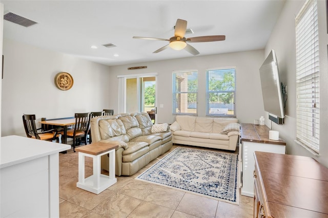 living area featuring visible vents, recessed lighting, ceiling fan, and light tile patterned floors