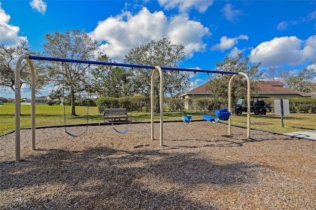communal playground with a lawn