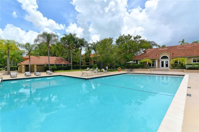 pool with a patio