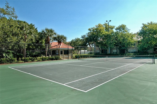 view of sport court with fence and community basketball court