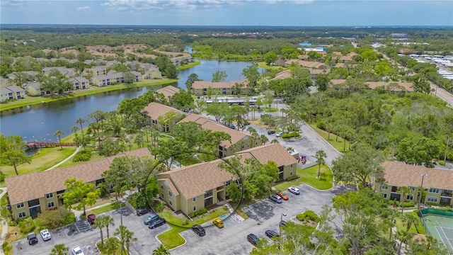 aerial view featuring a water view and a residential view