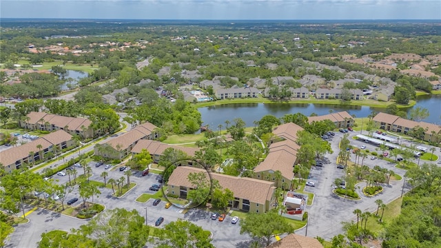 aerial view with a water view and a residential view