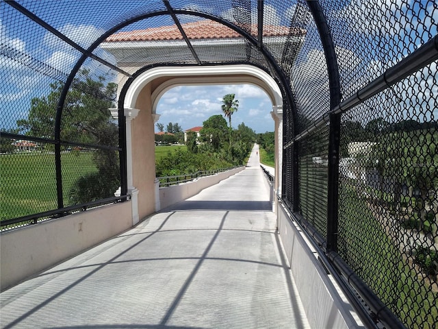 view of property's community featuring fence