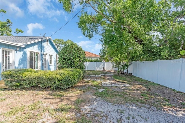 5012 Eastchester Dr, Sarasota, FL 34234 - view of yard with a fenced backyard