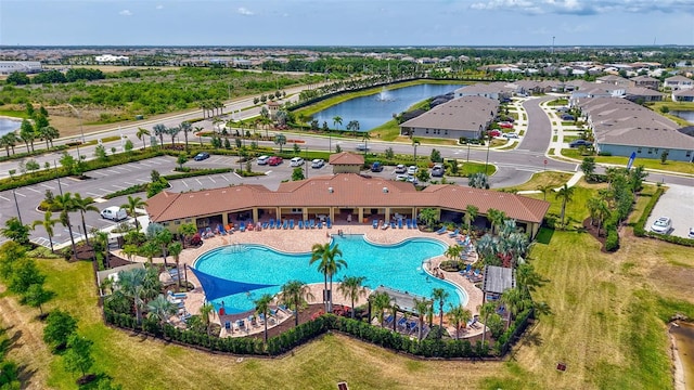 birds eye view of property featuring a water view