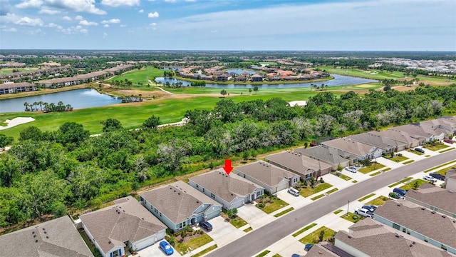 birds eye view of property with a water view, golf course view, and a residential view