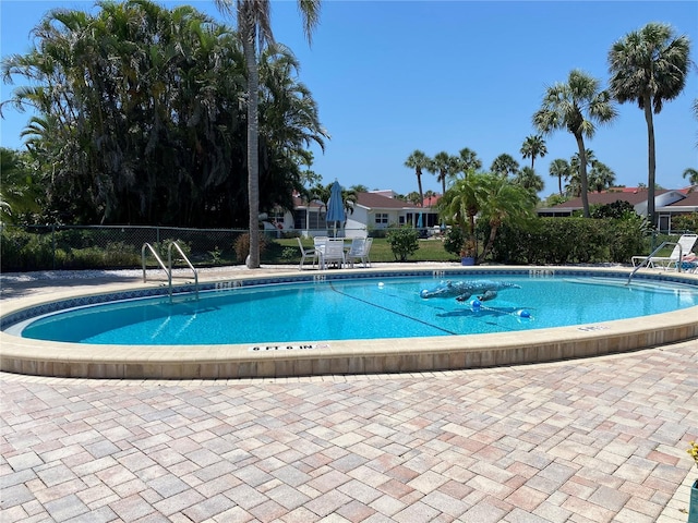 community pool with fence