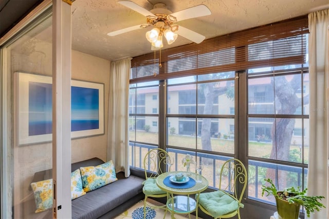 2280 Stickney Point Rd Unit 420, Sarasota, FL 34231 - sunroom featuring a textured ceiling