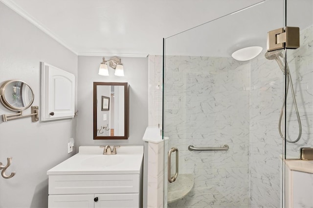2280 Stickney Point Rd Unit 420, Sarasota, FL 34231 - bathroom featuring crown molding, vanity, and a stall shower