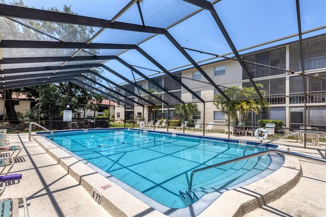 2280 Stickney Point Rd Unit 420, Sarasota, FL 34231 - pool with a patio and glass enclosure