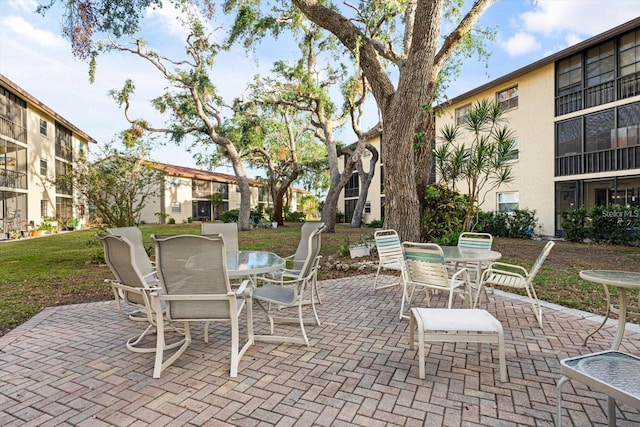 2280 Stickney Point Rd Unit 420, Sarasota, FL 34231 - view of patio featuring outdoor dining area