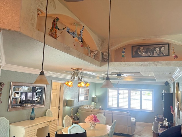 652 N Elm St, Englewood, FL 34223 - dining area with crown molding, plenty of natural light, and ceiling fan