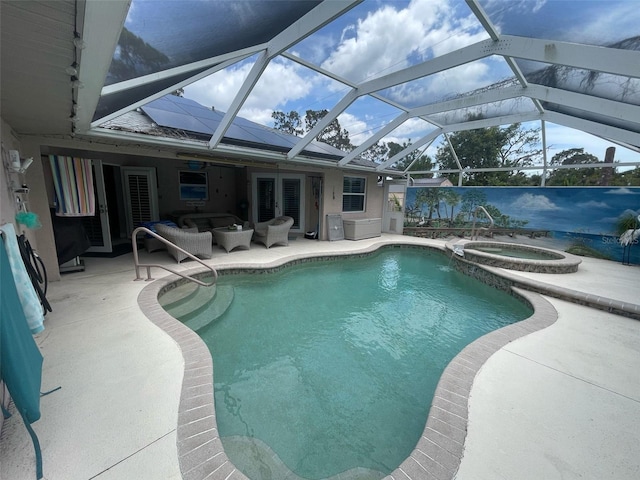 652 N Elm St, Englewood, FL 34223 - view of pool with french doors, a patio area, outdoor lounge area, a pool with connected hot tub, and glass enclosure