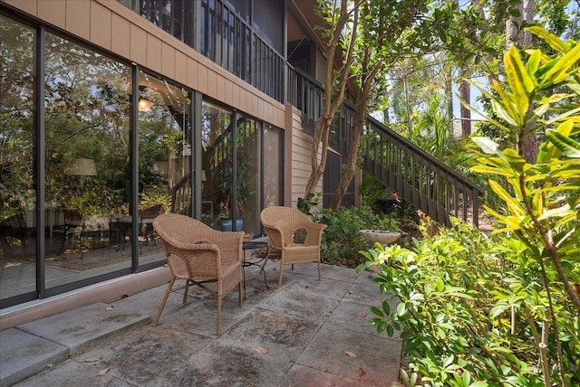 view of patio featuring stairway