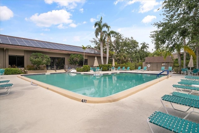 pool featuring a patio