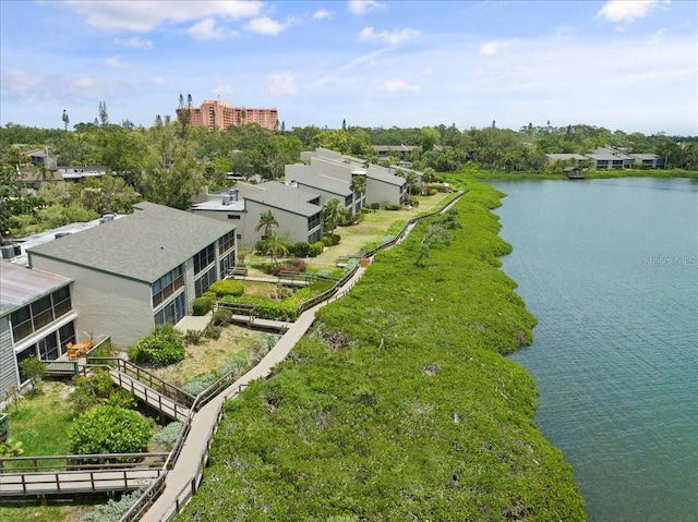 bird's eye view with a water view