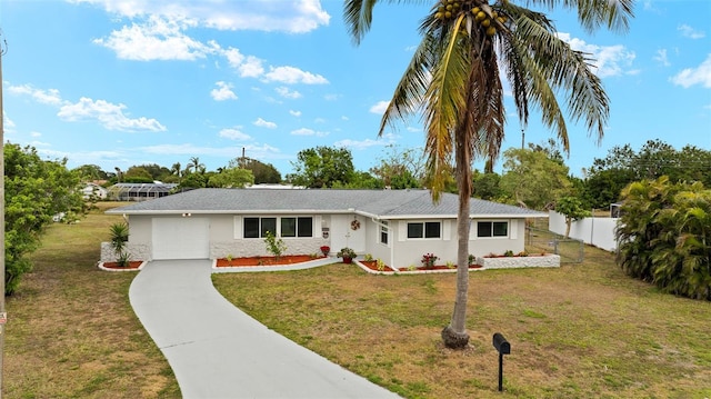 1458 Alwynne Dr N, Lehigh Acres, FL 33936 - ranch-style home with fence, a front lawn, a garage, stucco siding, and driveway