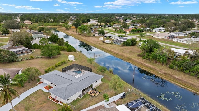1458 Alwynne Dr N, Lehigh Acres, FL 33936 - drone / aerial view featuring a residential view and a water view