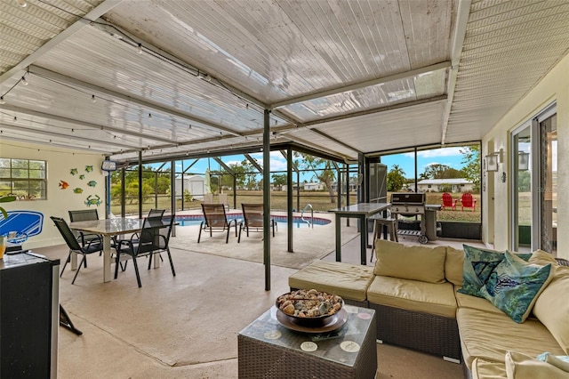 1458 Alwynne Dr N, Lehigh Acres, FL 33936 - sunroom / solarium with outdoor dining space and an outdoor living space