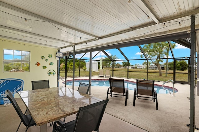 1458 Alwynne Dr N, Lehigh Acres, FL 33936 - view of patio with a storage unit, an outdoor structure, an outdoor pool, and a lanai