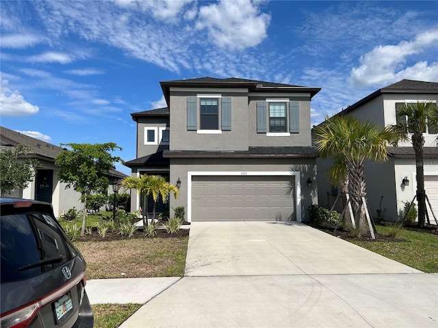 5521 Summit Gln, Bradenton, FL 34203 - traditional-style home featuring stucco siding, driveway, and a garage