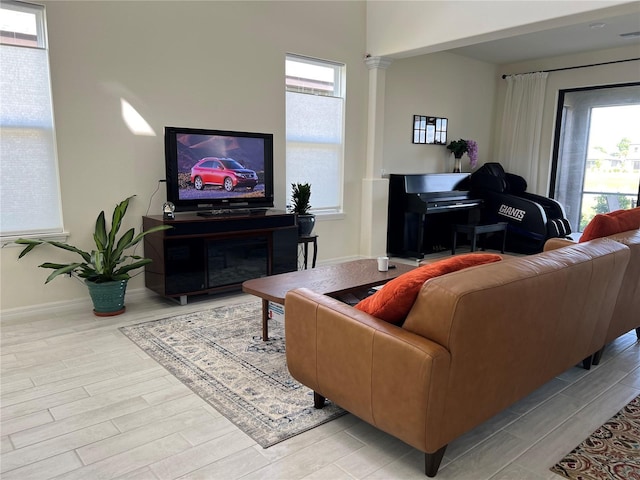 5521 Summit Gln, Bradenton, FL 34203 - living room featuring light wood-style flooring and baseboards