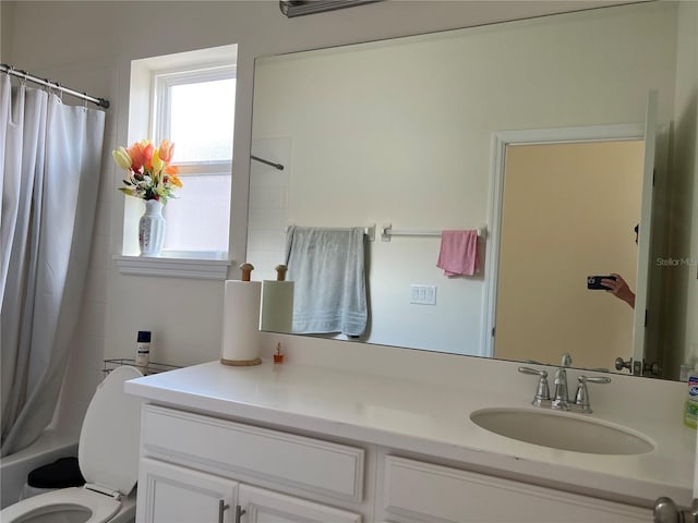 5521 Summit Gln, Bradenton, FL 34203 - bathroom featuring vanity, toilet, and shower / tub combo with curtain