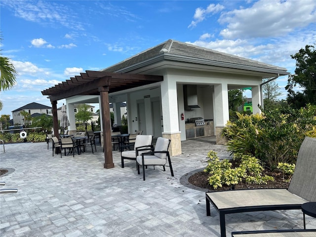 5521 Summit Gln, Bradenton, FL 34203 - view of patio featuring an outdoor kitchen, a pergola, outdoor dining area, and a grill
