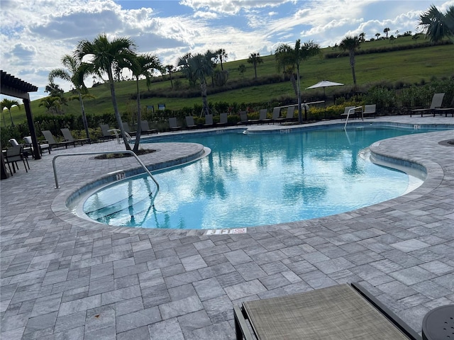 5521 Summit Gln, Bradenton, FL 34203 - community pool featuring a patio area