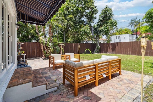 view of patio / terrace featuring a fenced backyard and an outdoor hangout area