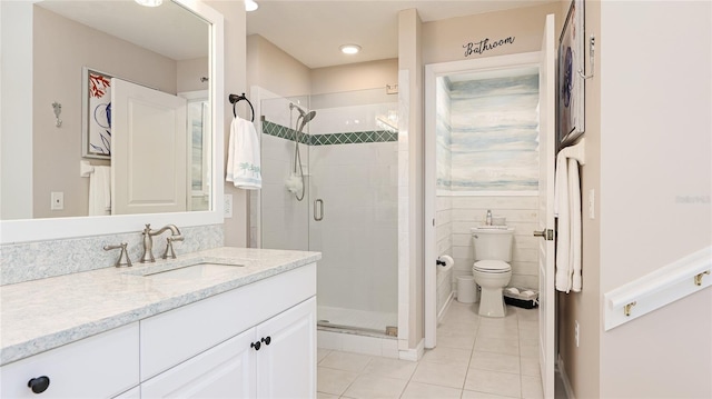 full bath with toilet, vanity, recessed lighting, tile patterned flooring, and a shower stall