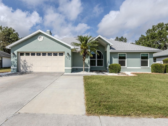 245 Woodingham Trl, Venice, FL 34292 - ranch-style house featuring driveway, stucco siding, a front yard, and an attached garage