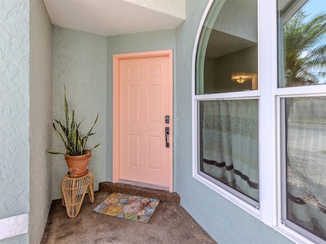 245 Woodingham Trl, Venice, FL 34292 - property entrance featuring stucco siding