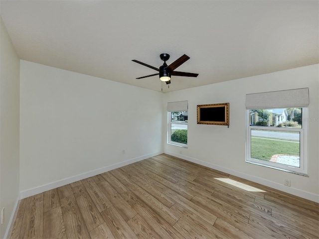 245 Woodingham Trl, Venice, FL 34292 - unfurnished room with light wood-style flooring, baseboards, and ceiling fan