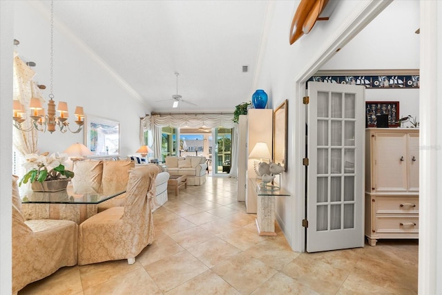 interior space with crown molding, light tile patterned floors, vaulted ceiling, and ceiling fan with notable chandelier
