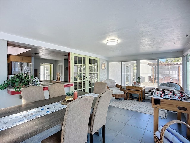 6012 11th Ave W, Bradenton, FL 34209 - sunroom featuring tile patterned floors and french doors