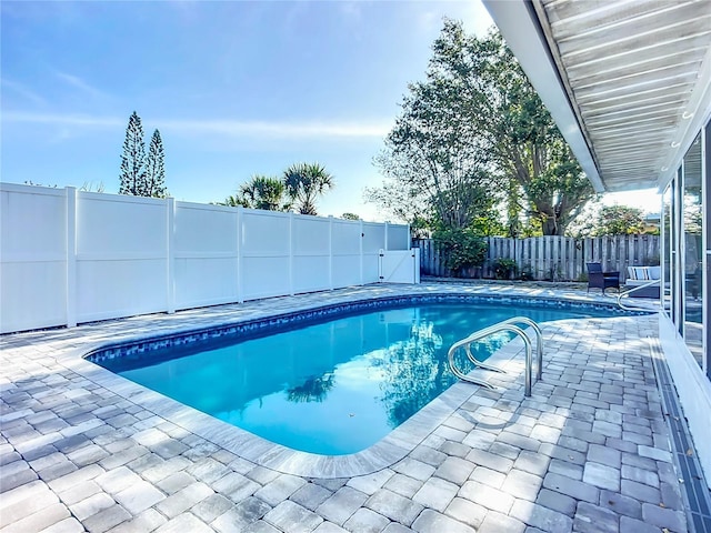 6012 11th Ave W, Bradenton, FL 34209 - view of pool featuring a fenced backyard, a patio, and a fenced in pool