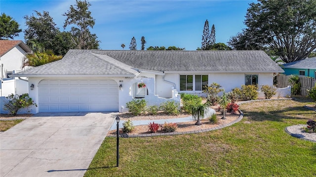 6012 11th Ave W, Bradenton, FL 34209 - ranch-style home featuring fence, a garage, stucco siding, concrete driveway, and a front lawn